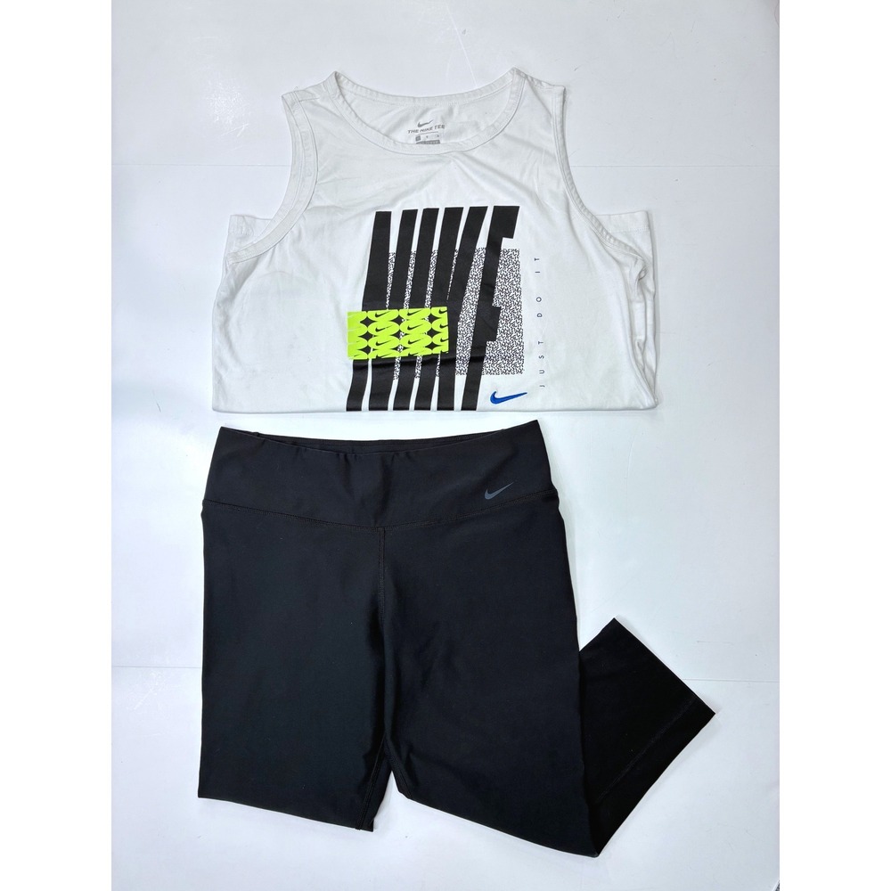 Sold.   Nike Bundle Womens Dri-FIT Graphic Tank and Cropped Leggings Set White